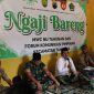 Kiai Amirudin mengkaji Kitabul Arbain fi Ushuliddin karya Imam Al Ghazali saat kegiatan Ngaji Bareng 5 Pilar Majelis Wakil Cabang Nahdlatul Ulama (MWC NU) bersama Forum Komunikasi Pimpinan Kecamatan (Forkopincam) Tahunan, Senin (3/4/2023)